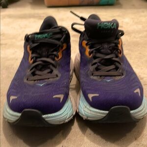 Hoka size 8 wide navy women’s running shoes.